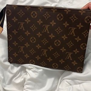 louis vuitton 26 toiletry pouch, used negotiable